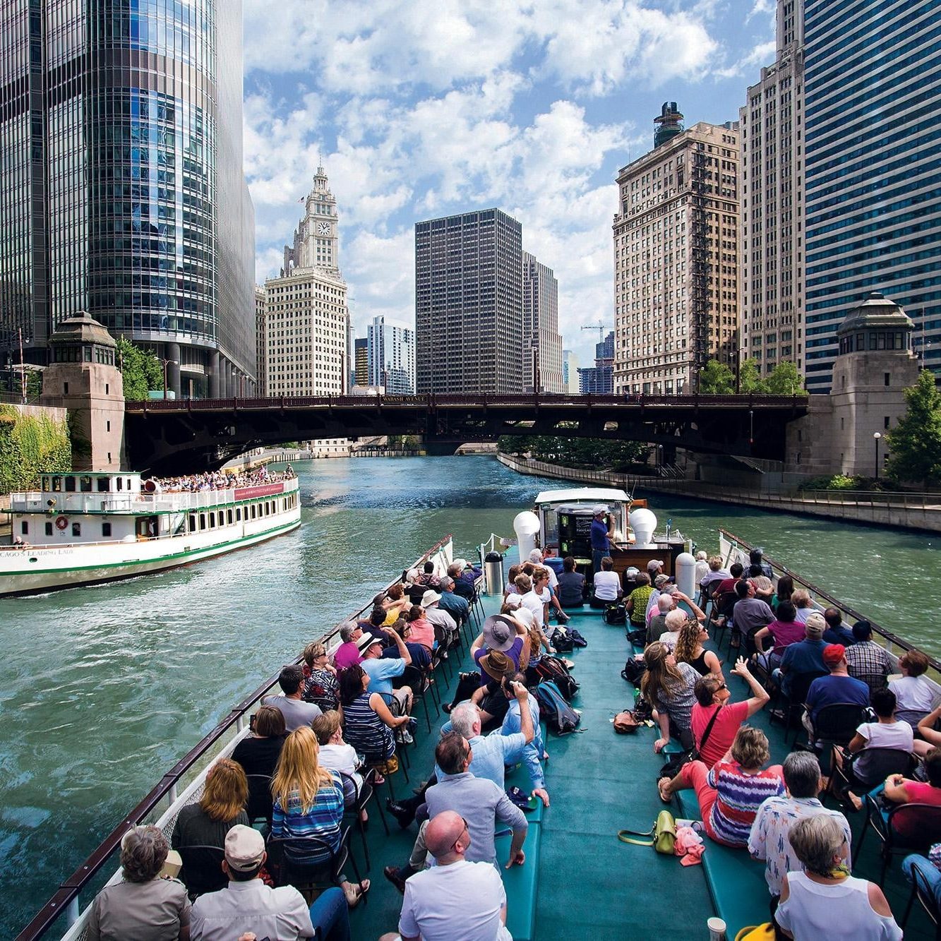 Boat tours at Chicago canal, popular destination for private aircraft charter